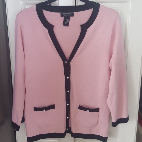 pink cardigan with black trim